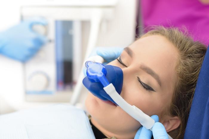 Patient receiving nitrous oxide sedation dentistry in Augusta